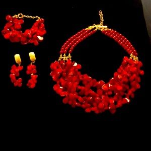 Pre-Owned, never used. Authentic coral beads set: Necklace, bracelet & earrings.